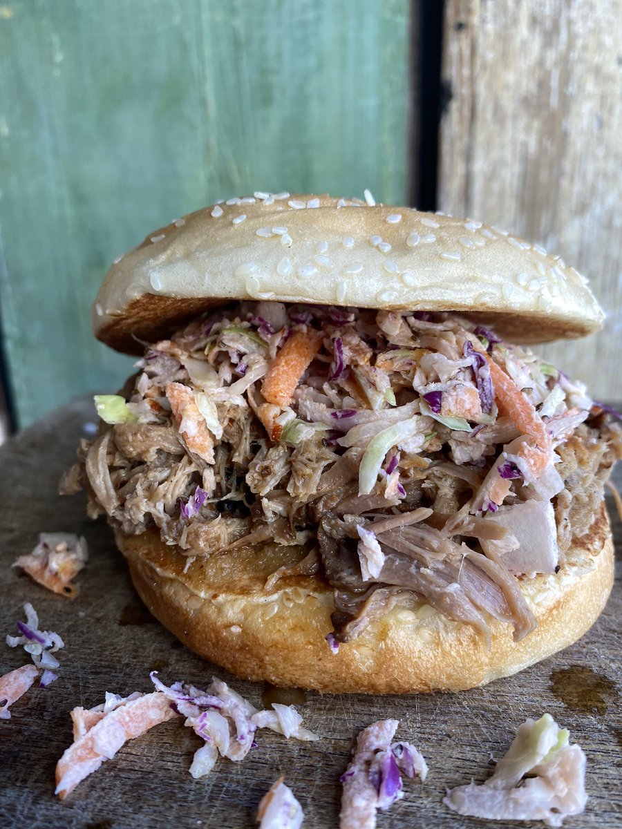 Look at this gorgeous special!! 
Pulled pork topped with cole slaw and an Eastern NC style BBQ sauce ✨