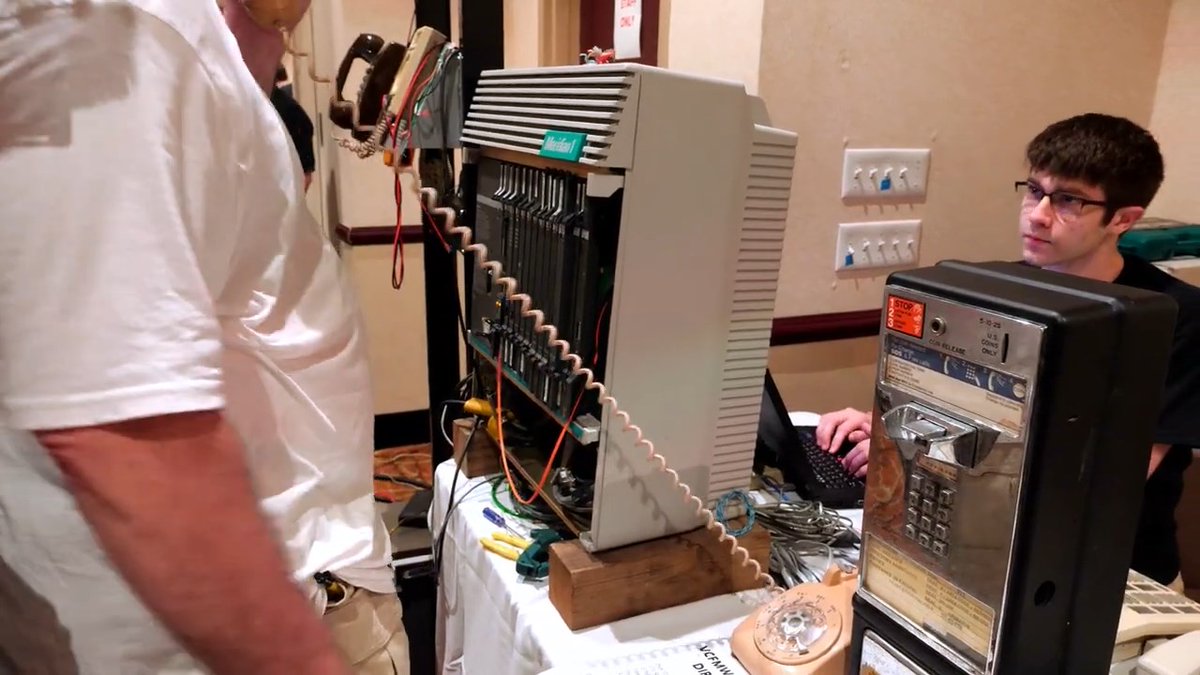 We've proudly presented joe_z with the Cockade of Infinite Billing for spreading word of Shadytel services - and Nortel PBXes - at VCF Midwest