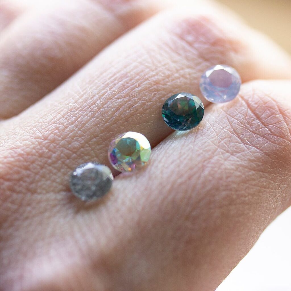 Trying to picture what colours to match these little gems with. I may need to make something extra special for the rainbow topaz. It’s the dark one, but it catches light in such an interesting way ✨ instagr.am/p/Cjd85dpOwkl/