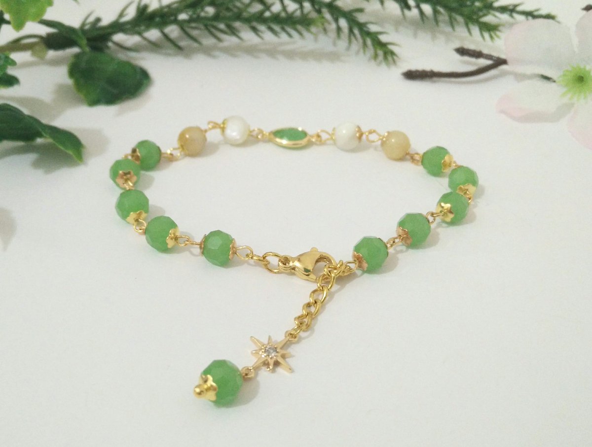 RabbiteersCo's tweet photo. I'm late for Olivine's birthday, but I got inspired and made a bracelet in his colors! His SSR's colors, to be exact... 👀✨ #nucarnival #NUカーニバル https://t.co/FrR2Ssz4RJ
