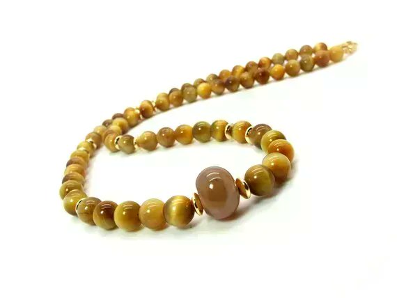 DesignsbyAudrey's tweet image. Golden Tigers Eye and Agate Mens Necklace - Golden Earth Mens Necklace – Mens Golden Brown Necklace by #DesignedbyAudrey. Awesome mens #handmade jewelry and accessories buff.ly/3fMnut9 via @Etsy