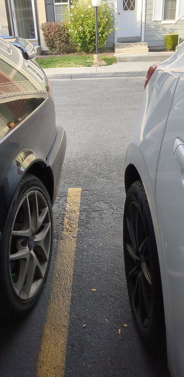 whosTimApple's tweet photo. Remember my old neighbor who got paint all over my car? His replacement may be worse. Look how much room this man gave me to my back door where Atlas' car seat is. He parks like this every single day. https://t.co/3ZBtDwuDbU