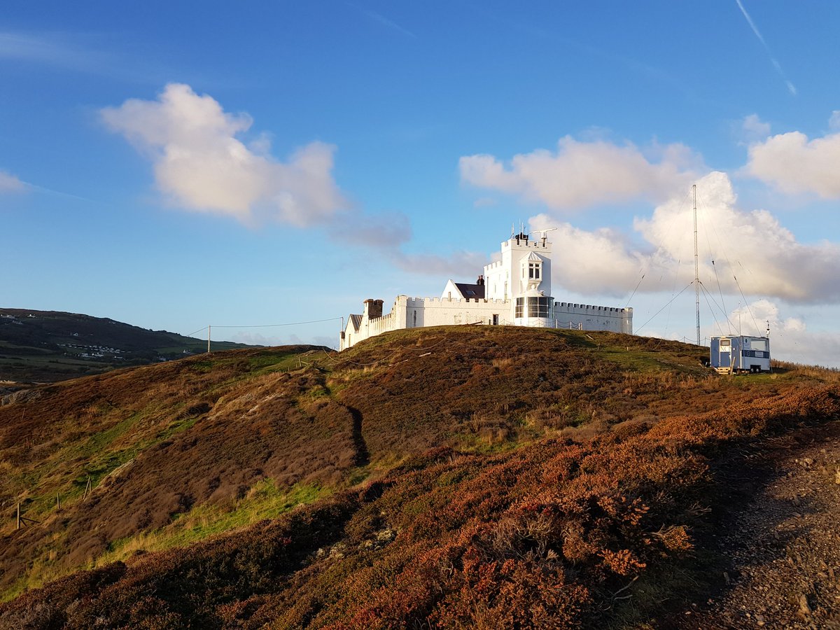 kendie's tweet photo. Up early to watch the sunrise... but it hid behind clouds. The rissos dolphins put on a fantastic display so well worth getting up early for. I will miss this view ... til next time β€ #PointLynasLighthouse #Anglesey https://t.co/l5ZLOgg2E6