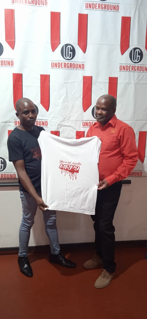Presenting an MRP9 Tshirt to Cde Ngqabutho Nicholas Mabhena. General Secretary of the Zimbabwe Communist Party. A dear brother.