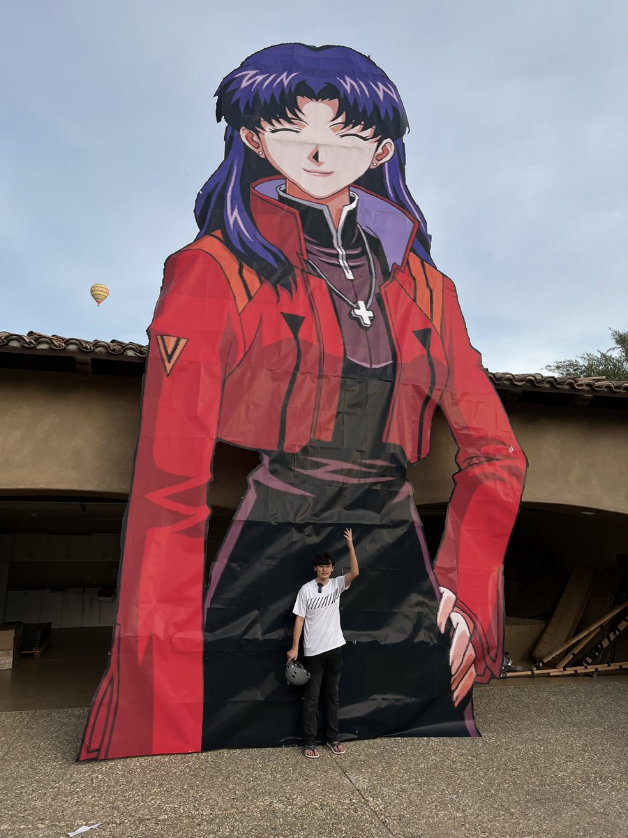TobynJacobs's tweet photo. I made a 30ft tall cutout of Misato Katsuragi. Also thanks to @Babylonian for helping out put her up and for the visit! #nge #evangelion #neongenesisevangelion https://t.co/o54h9BRgw6