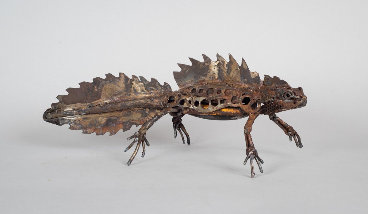 HarrietMead1's tweet photo. Great Crested Newt. I've included a flash of yellow from the handles of a pair of tinsnips for the belly colour. Spots are bike spanners. #newt #newtsculpture https://t.co/qJFNePR9j7