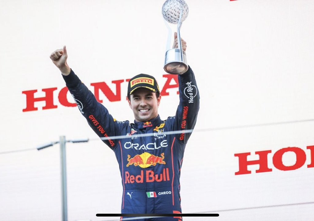 SChecoPerez's tweet photo. Congratulations, champion! @Max33Verstappen 
Well deserved championship. I feel very proud of you and what a way to do it, in front of our Honda home race!
Let’s go for more! 1-2 to finish this championship on top! Congrats @redbullracing https://t.co/M8LWSS5jei