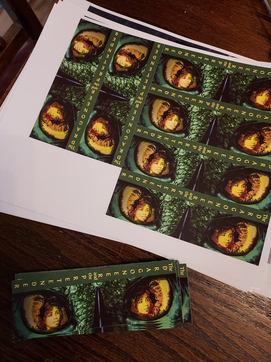 AnAmberAuthor's tweet photo. In today's example of what it's like to be an author published by a small, independent press - bookmarks! I had these printed and am cutting them out for an event next weekend. #writingcommunity #amwriting #TDTP https://t.co/LPpLJOwLdn