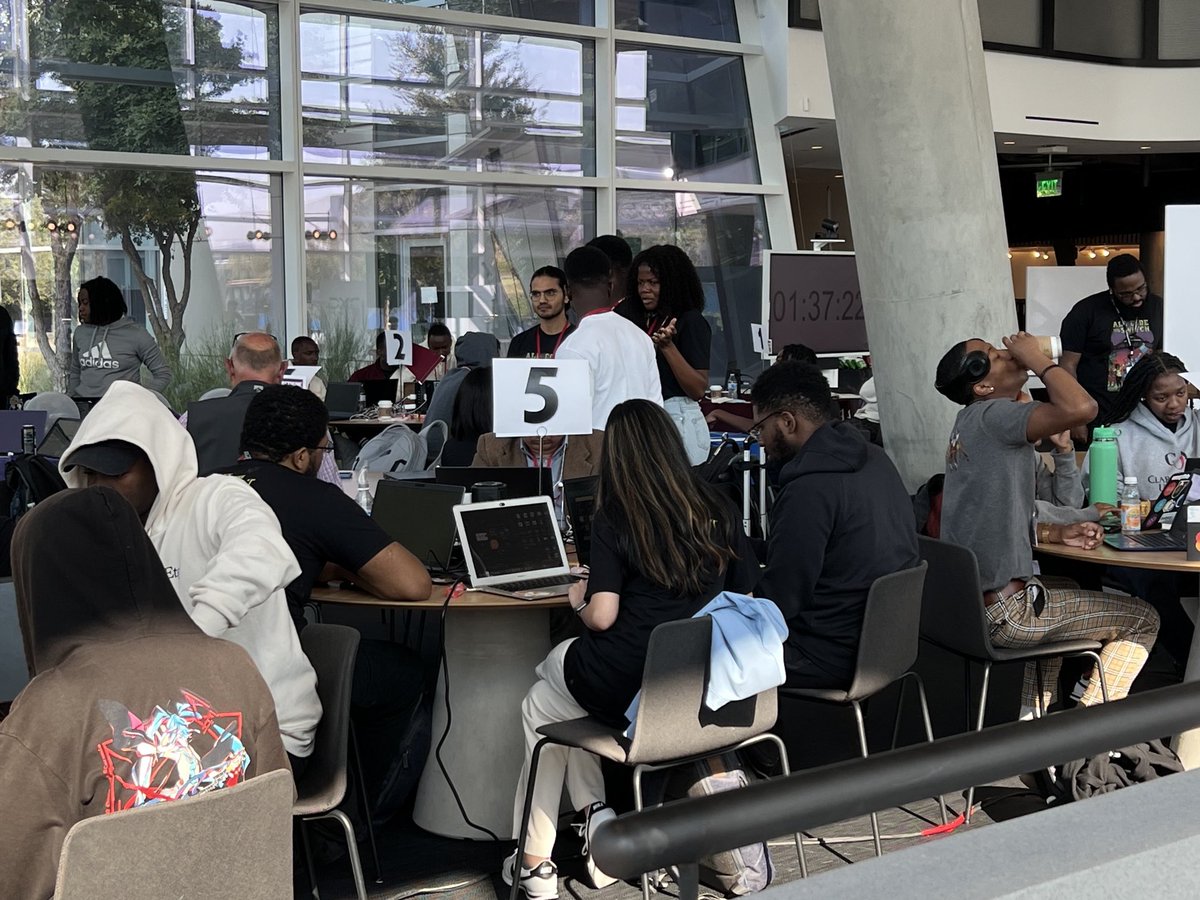 blackenterprise's tweet photo. We’re coming down to the final half hour of the #BEHackathon…more than 23 hours of hacking, planning, coffee & snacks! @AmericanAir @Hyatt @NowAndLater @RapSnacksNow https://t.co/wMoLGgmgLl