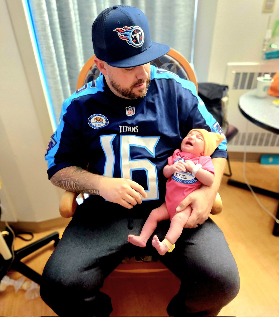 damianest_91's tweet photo. Only 1 day old and already putting on the gear for gameday! Welcome Lucia to the Titans family! #CaliforniaTitansFans #TitanUp #GameDay #LetsGetThisW @CaliTitansFans @Titans https://t.co/n4G1wQG9q4