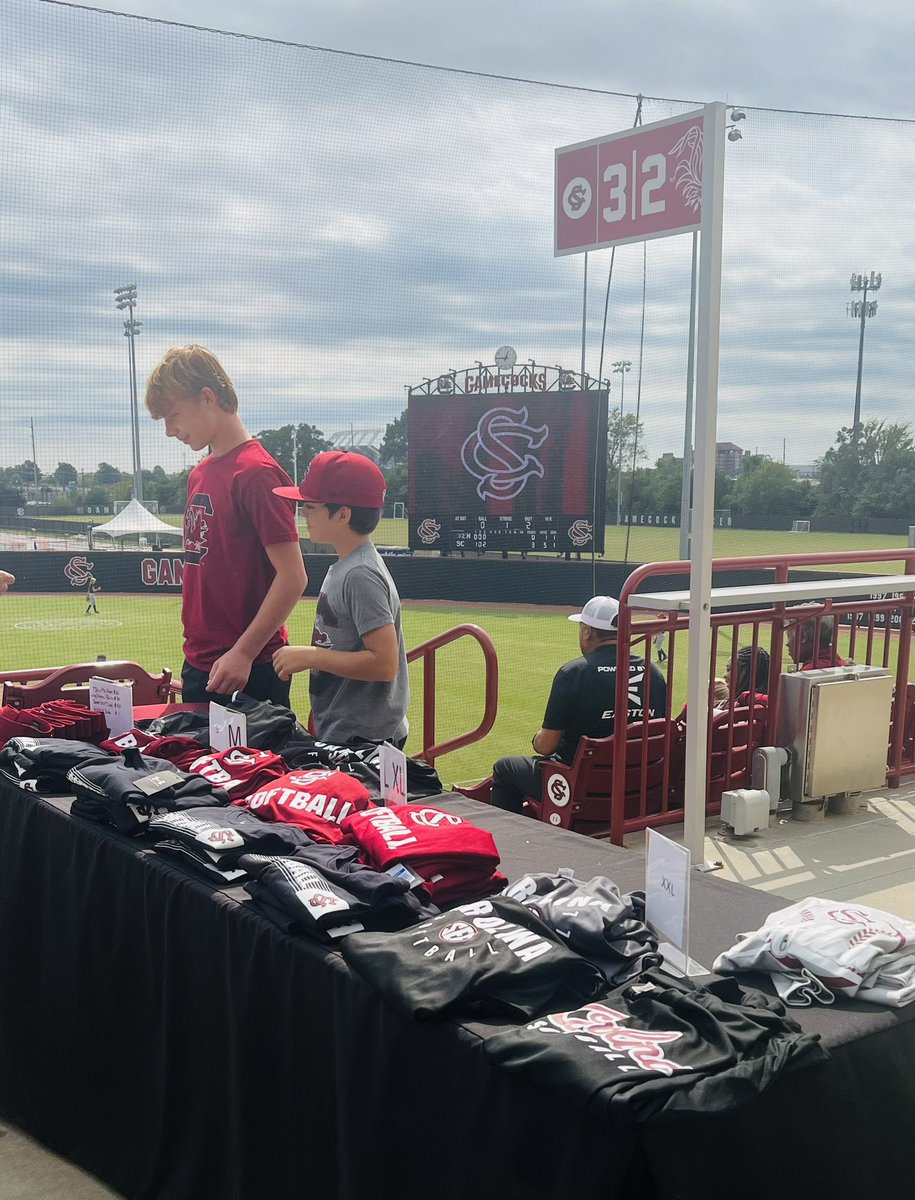 The sun is starting to peek through the clouds, so come out and support <a href="/GamecockSoftbll/">South Carolina Softball</a>! Since the games are FREE today, you’ll have some pocket money left to spend on swag. Current shopkeepers - <a href="/Coach_JBloomer/">Coach Josh Bloomer</a>’s boys.