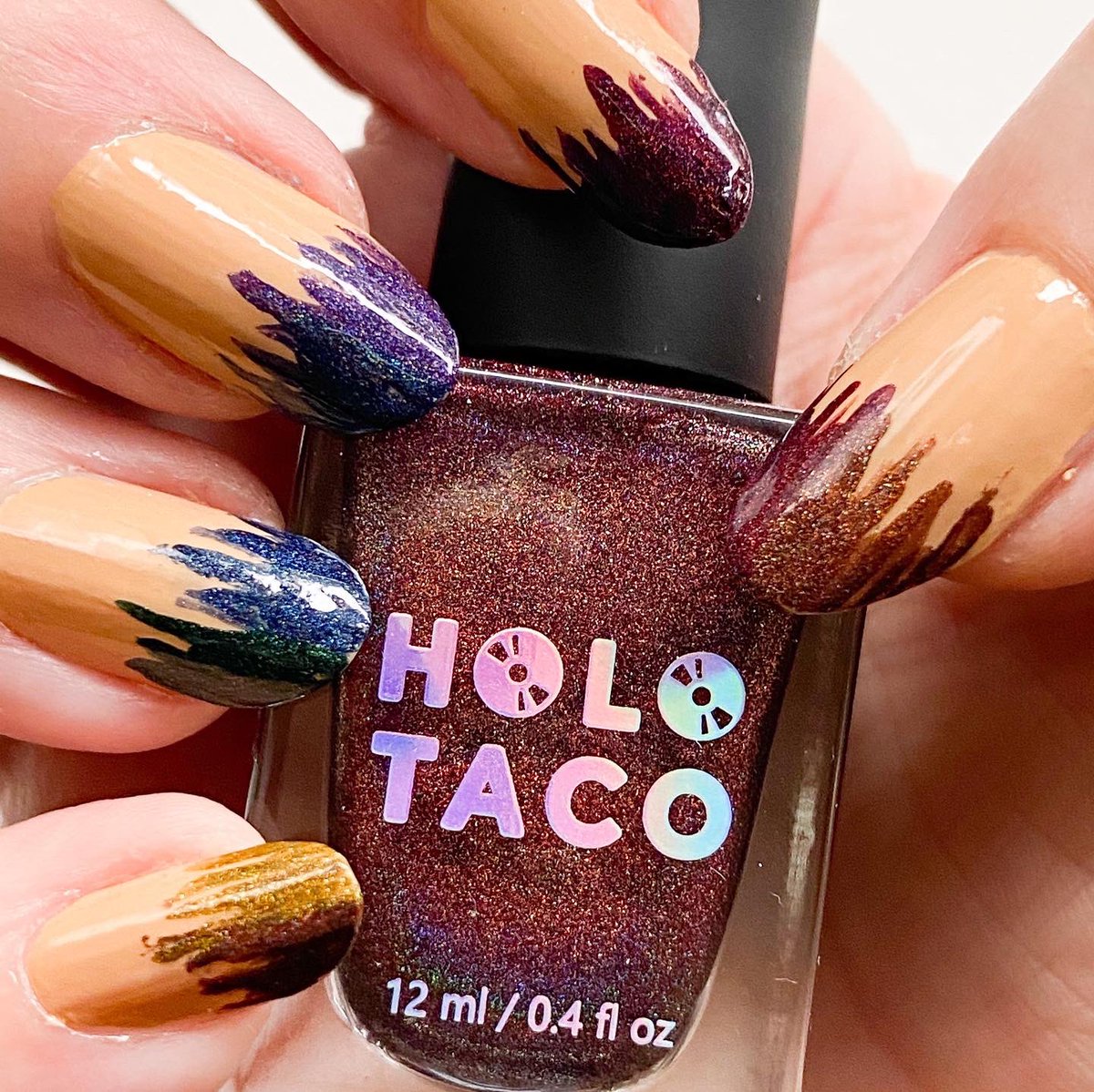 nailbrag's tweet photo. Wearing the whole @holotaco dark holo rainbow collection at once. Love these fall shades! 🖤 https://t.co/XEZ4rJG904