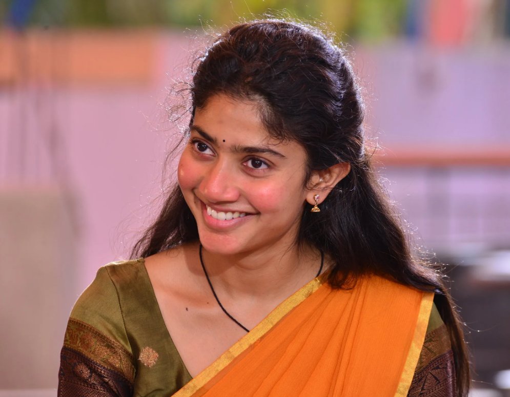 filmfare's tweet photo. Congratulations! 

The Filmfare Award for Best Actor In A Leading Role (Female) - Telugu goes to #SaiPallavi for #LoveStory at the 67th #ParleFilmfareAwardsSouth 2022 with Kamar Film Factory. https://t.co/bJ9aHnHC9b