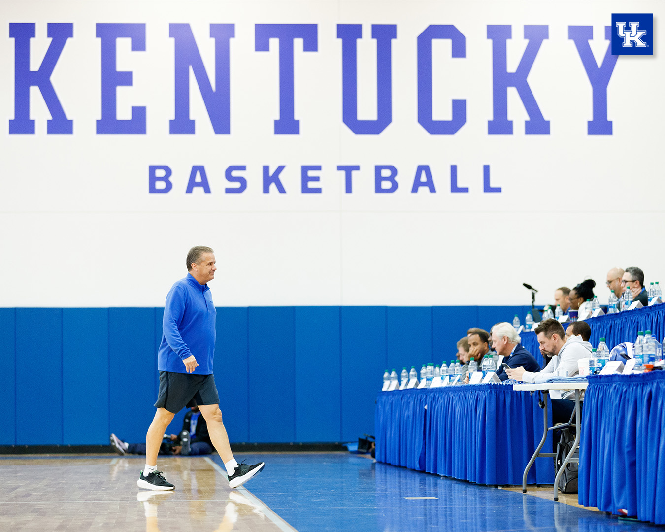 John Calipari walks towards NBA scouts during Pro Day.