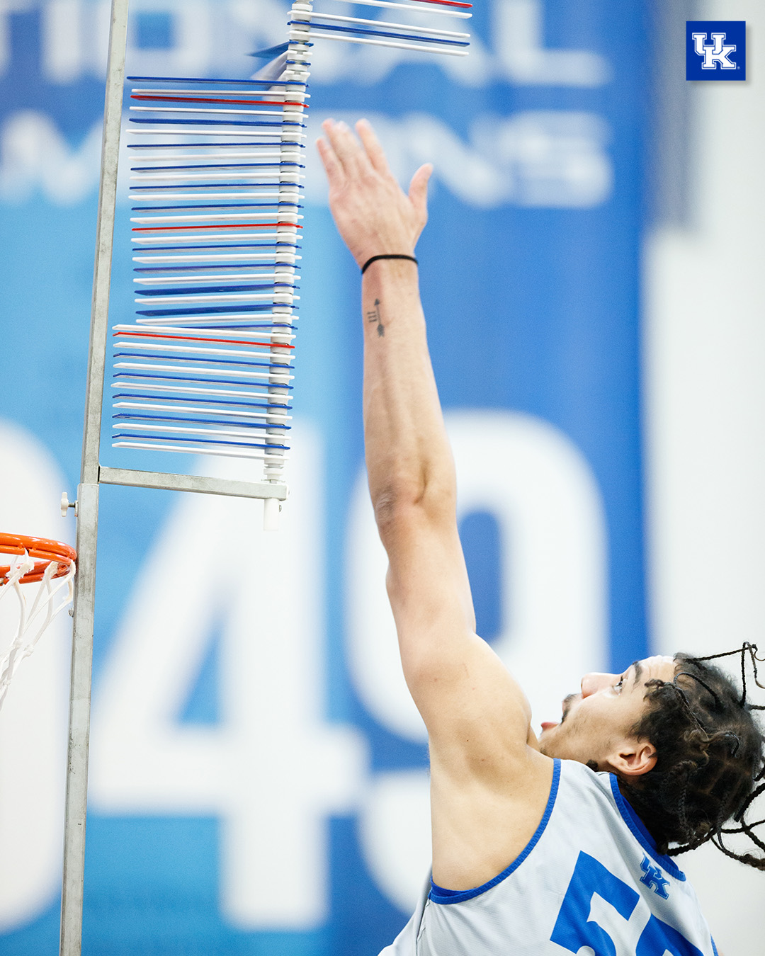 Lance Ware reaches during his vertical jump.