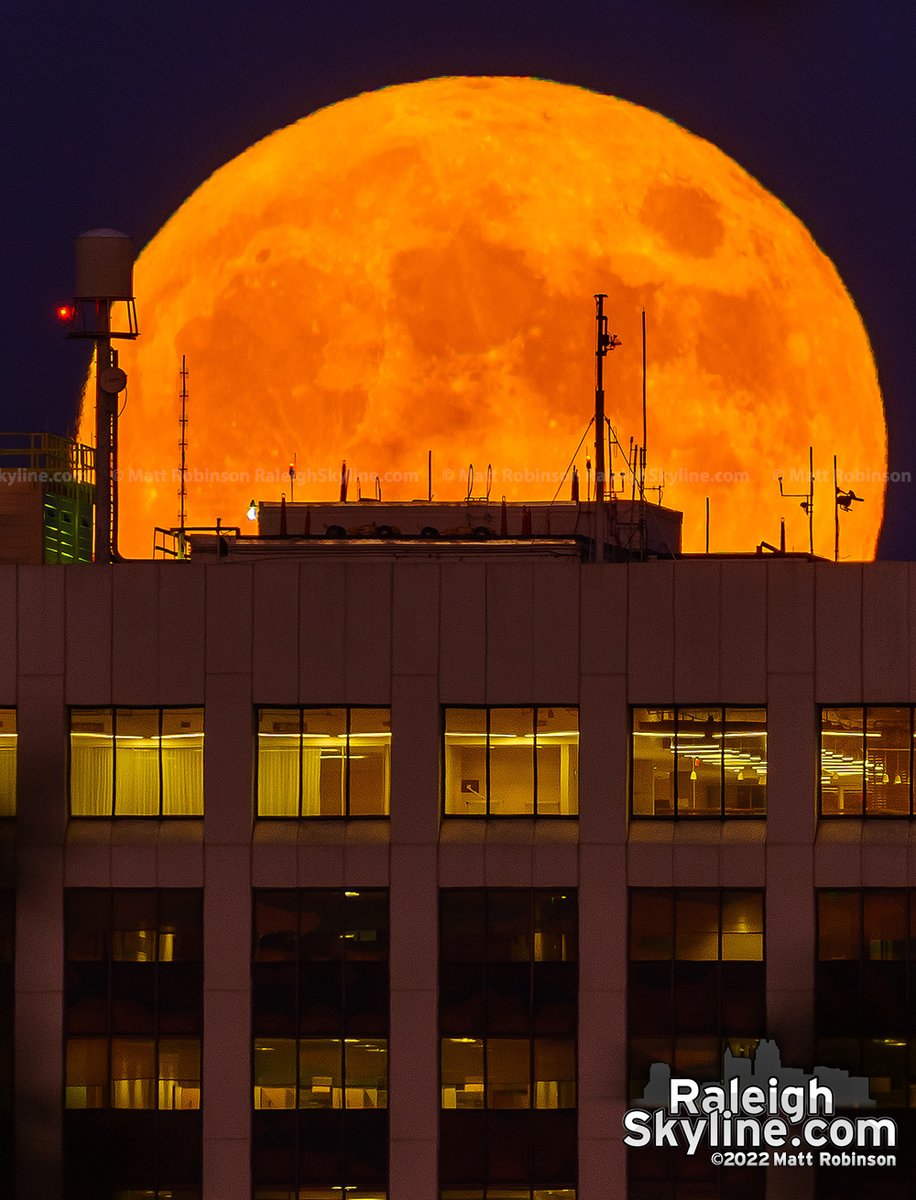 metroscenes's tweet photo. Tonight's full moon rising above downtown #Raleigh. https://t.co/6b27QaUftD