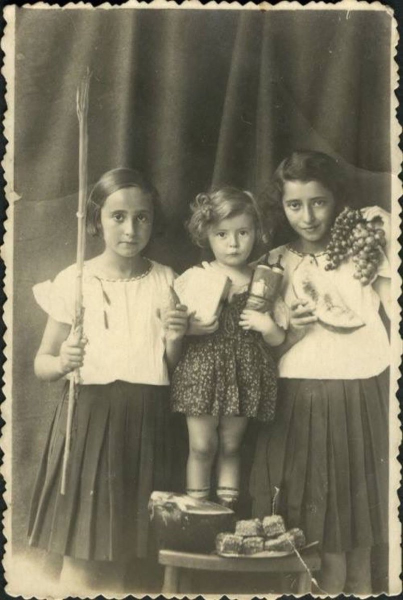 In memory : Three sisters from Obertyn, Galicia, now West Ukraine, near Kolomyja, during Sukkot, prewar.

From left - Donia,Sonja Shulamit and Esther Serger...brutal murdered in forest in Ghetto Kolomya 1943...only Sonja survived the Shoah.

Photo from Sonja to Yad Vashem.