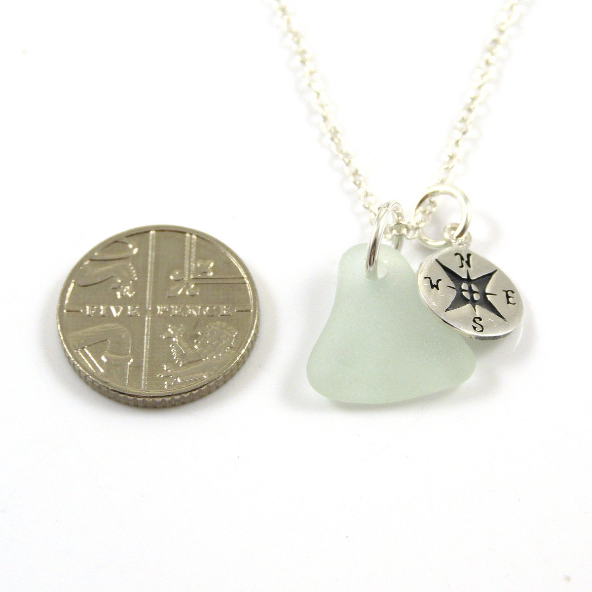 TheStrandline's tweet photo. Light Teal Sea Glass, Sterling Silver Compass Charm Necklace, Gift Boxed - Ready to Ship https://t.co/MjMAPynWgF #UKGiftHour #northumberland #warkworth #UKGiftAM #EarlyBiz #Etsy #supportsmallbusiness #HandmadeHour #shopindie #CompassCharm https://t.co/iuSAjnR1dZ