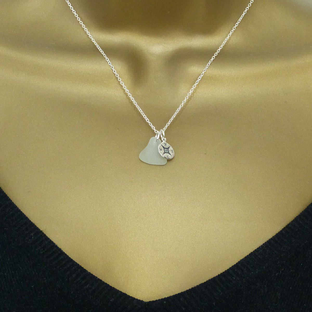 TheStrandline's tweet photo. Light Teal Sea Glass, Sterling Silver Compass Charm Necklace, Gift Boxed - Ready to Ship https://t.co/MjMAPynWgF #UKGiftHour #northumberland #warkworth #UKGiftAM #EarlyBiz #Etsy #supportsmallbusiness #HandmadeHour #shopindie #CompassCharm https://t.co/iuSAjnR1dZ