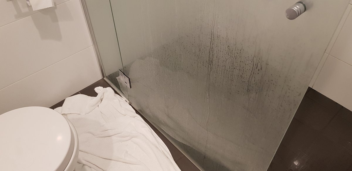 Section18c's tweet photo. These shots are not in the booking photos, now we know why, so you stand in water and we stop/wait for water to drain and start shower again. Maybe we got this room because: https://t.co/mP3hqt3Pbr https://t.co/4y0o1Pam7C