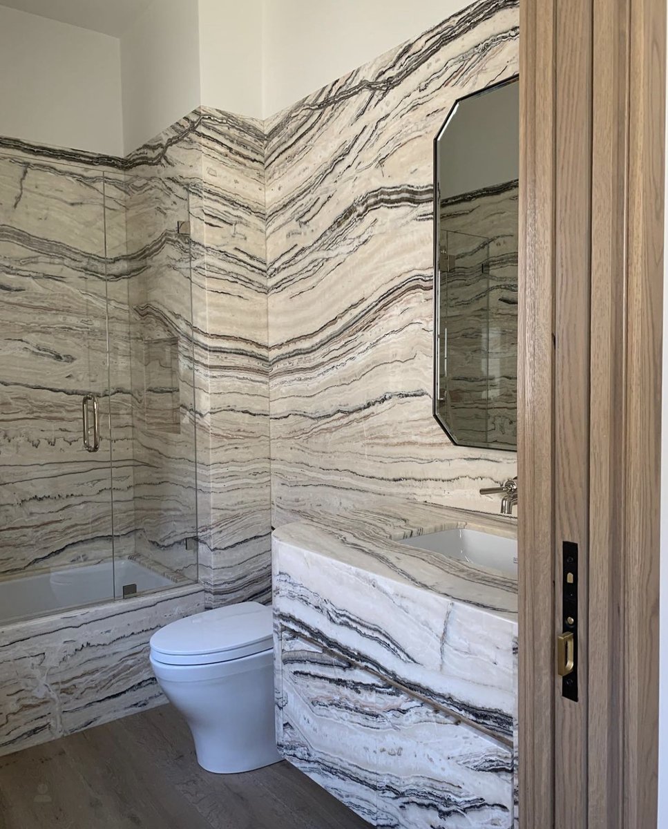 Explore the full potential of your morning routine with gorgeous stone striations. . . . #luxuryliving #luxuryhome #luxurybathroom #interiordesign