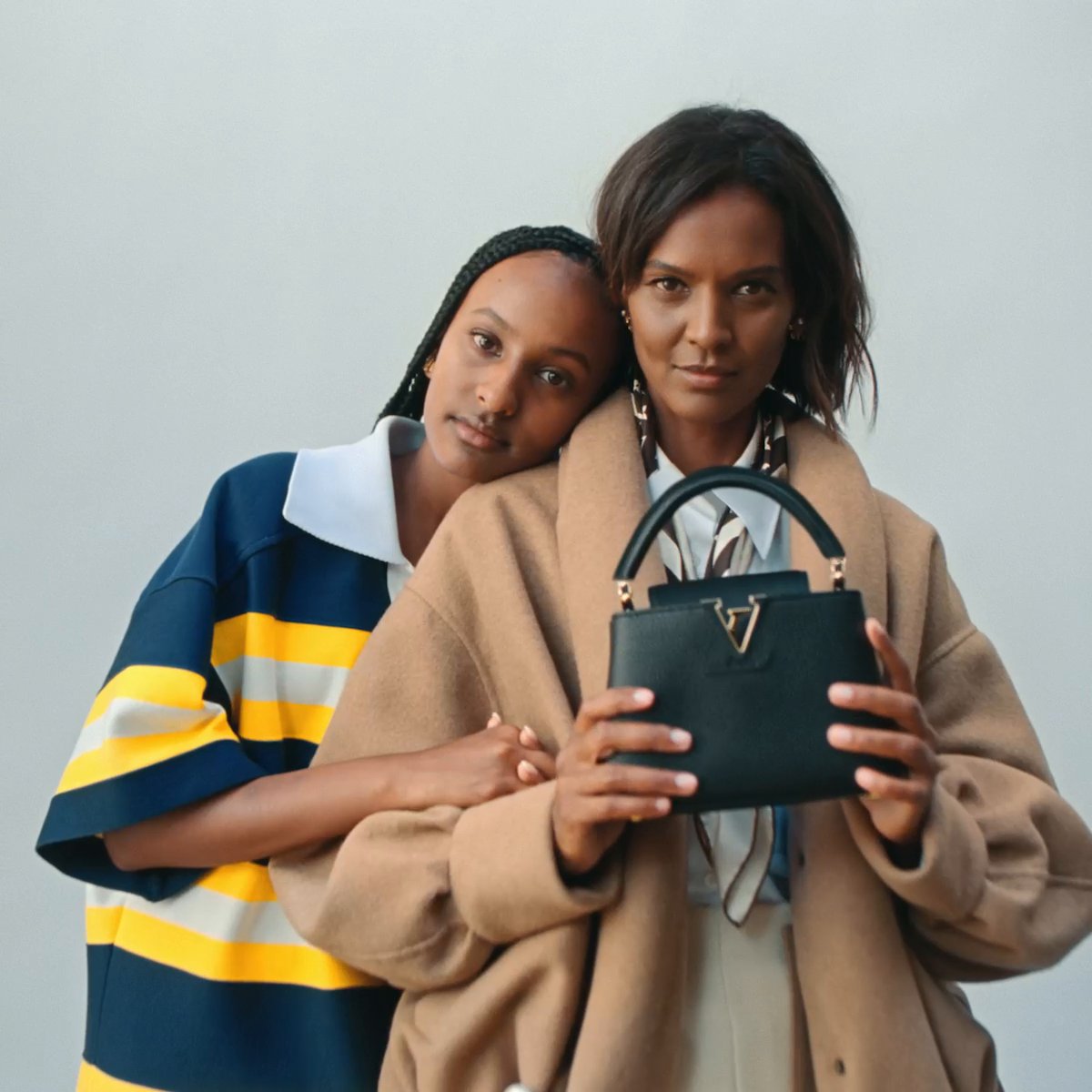 Louis Vuitton on X: A story of style. Paying homage to one of the Maison's  most iconic bags, Liya Kebede and her daughter Raee embody the season's  editions of the #LVCapucines in