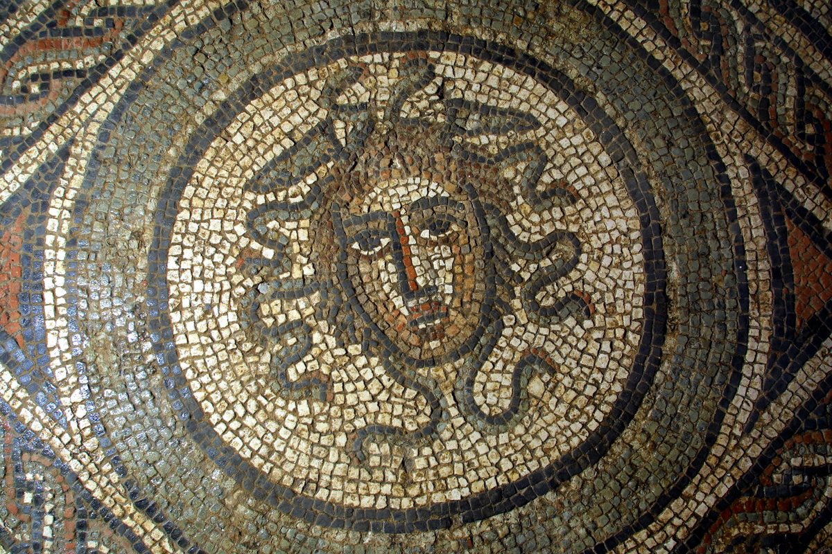 Brading Roman Villa was excavated during 1880-81. Photos taken at the time show the mosaics as they were being unearthed. Here is our Medusa with some of her face missing next to an image of how she now looks after being restored. #MosaicMonday #Roman #Archaeology #photo #museum