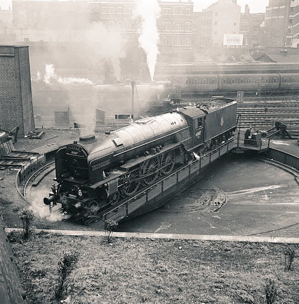 🎶🎵🎶 You spin me right round, baby right round 🎶🎵🎶.... A #ClassA1 4-6-2 locomotive No.60117 '#BorisRussell' on a turntable at #London #KingsCross #Depot 09/1950.... #MotivationMonday! @RailwayCentral