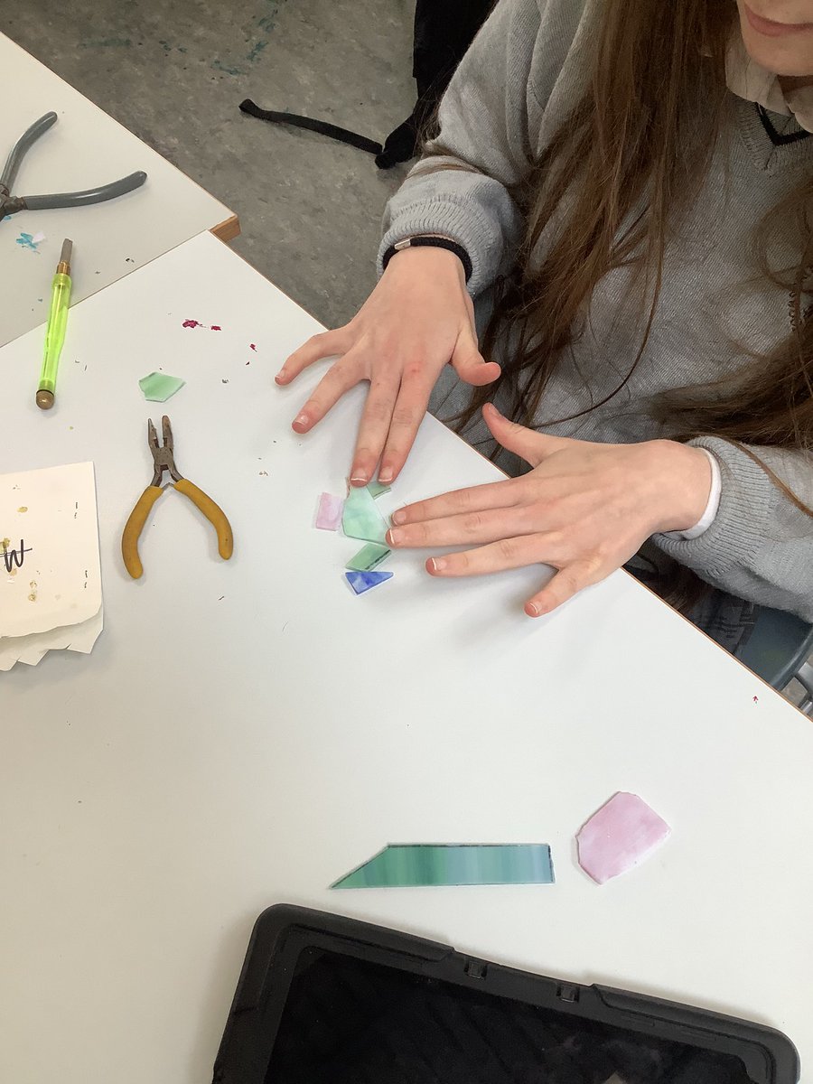 Oide_SarahMc's tweet photo. TYs nearly halfway through their Stained Glass module! Students are making a hanging decoration by cutting coloured glass, wrapping in copper tape and soldering together. #transitionyear #ddletb @Kingswoodcc16 https://t.co/LcK15VwLJp