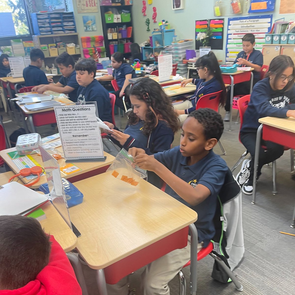 FrontierSchools's tweet photo. Take a look at our FSI Middle Tigers in Ms. Jolly's class using Cheez-Its to help grasp the concept of square units when solving for the area in Math. 🧮

What a fun (and yummy 😋) way to learn about square units! #FSIMiddle #Math https://t.co/9fnJC1fZxc