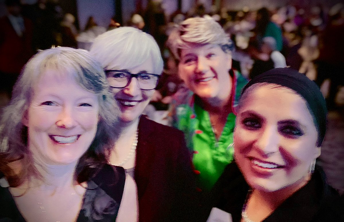 Fabulously fuzzy photo of three equally fabulous @Newnham_College women (and me) at the #WomenOfTheYear2022 Awards. #WOTY22