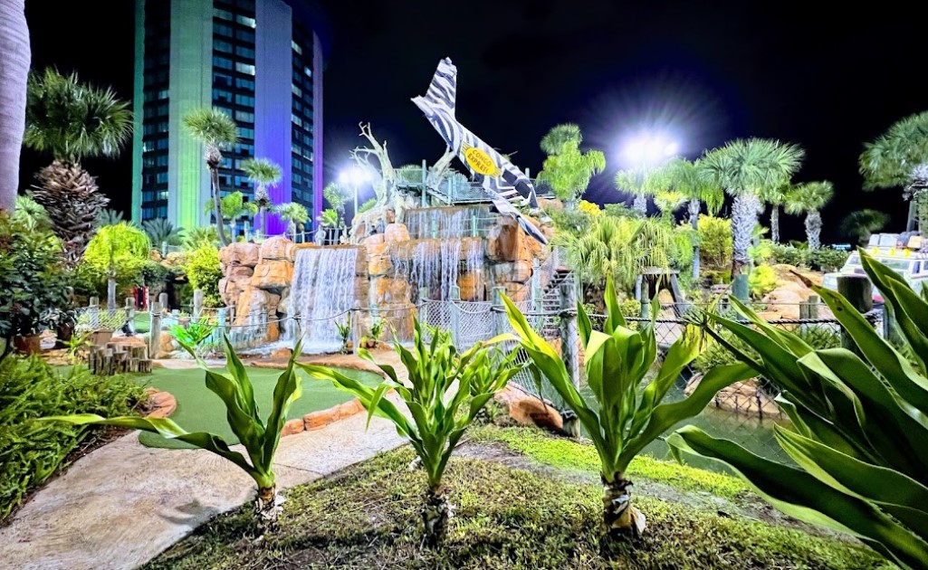 AccessMiniGolf's tweet photo. Course Highlight: Congo River I-Drive Mini Golf (Orlando, FL) is a fun adventure course 9 holes wheelchair accessible. https://t.co/WNWWn2v3wc @GolfCongoRiver @VisitOrlando #AccessMiniGolf #MiniGolf @PuttingPenguin @MisterMiniGolf @BrooksHolt @PuttCastMini @CouplePutts ♿️⛳️ https://t.co/PT8EsOi1t5