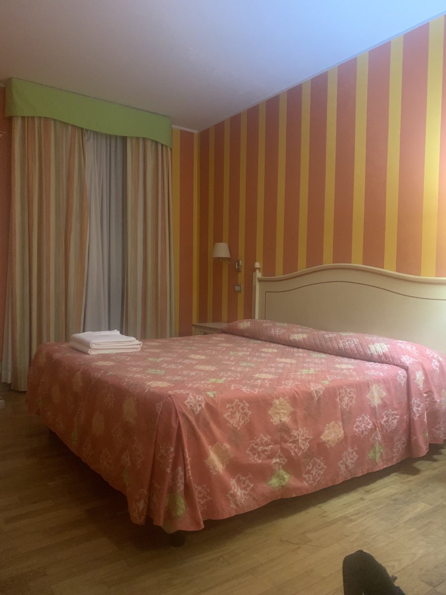 BromptonTrader's tweet photo. Alls well that ends well, I am now staying in a hotel in Vercelli, run by a guy that looks like Peter Stringfellow and decorated by Lawrence Lewellen Bowen, what could be a better end to difficult day https://t.co/J6YZPQYyRo