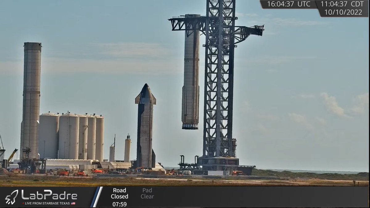 VickiCocks15's tweet photo. And up she goes! #B7 about to be back on the #OLM. #SpaceX have definitely refined the lift process. Seemed much quicker this time around. Dare we hope S24 is lifted next...today...? #Starbase will look so much more like a #LaunchComplex with them both up! @LabPadre #Nerdlecam https://t.co/Cc9hyRpsIC