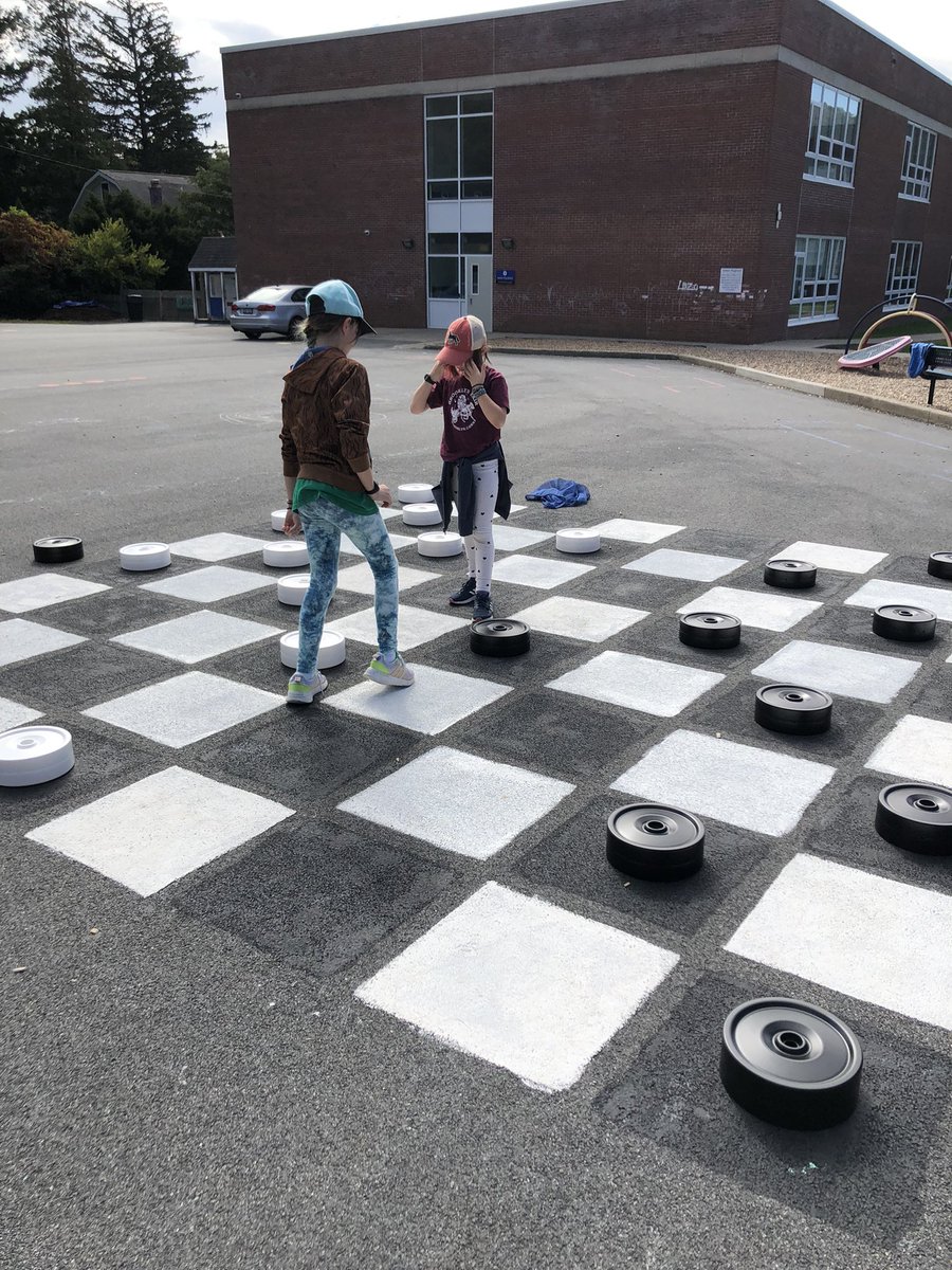 When your mom is the principal you have to go to school on your day off but you get to be the first to use The giant checker board. Ready for recess tomorrow!