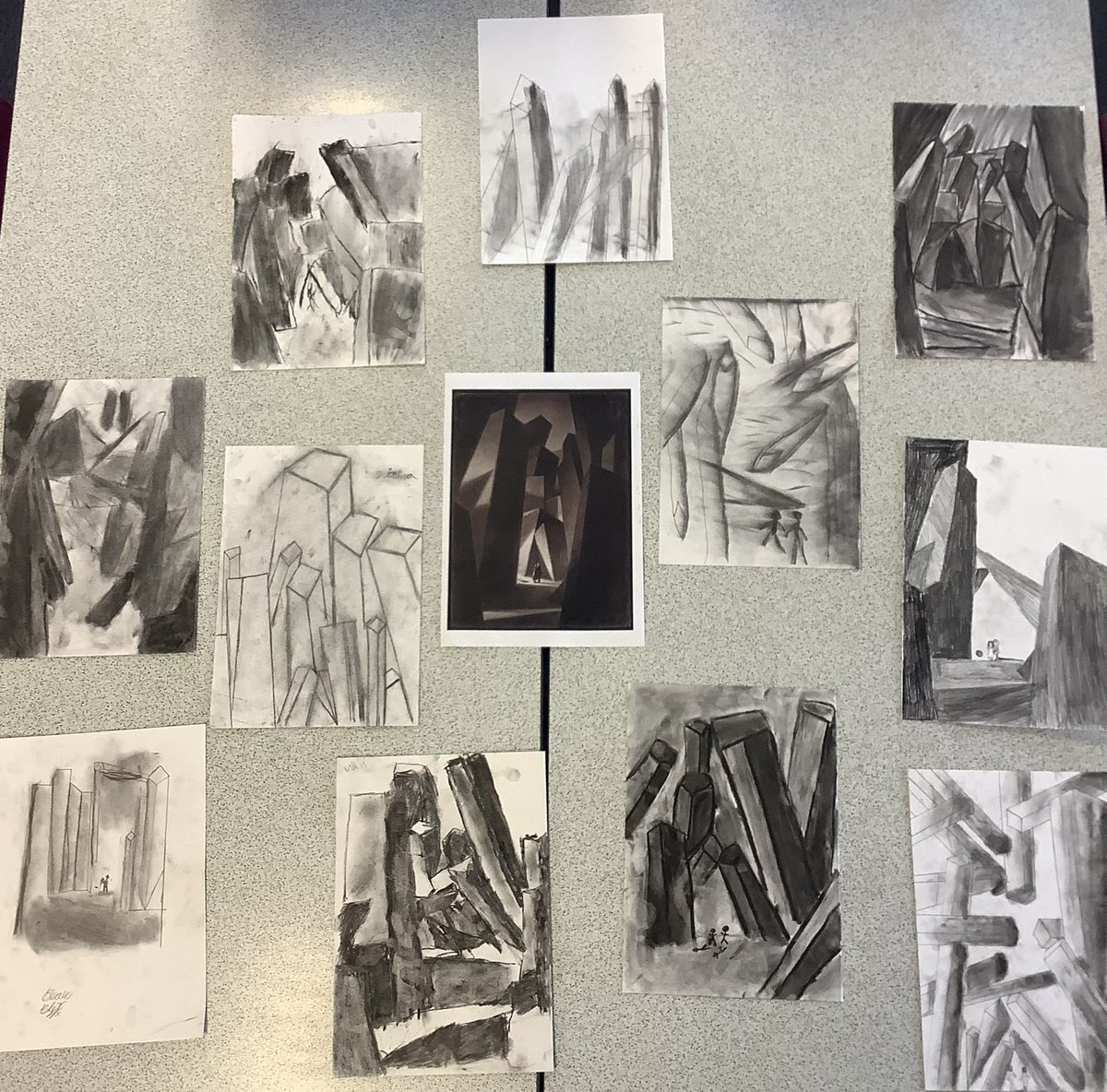 Llysfaen2023's tweet image. We were testing out a new medium of art this afternoon in #6GJ  and #6CP! 

The charcoal came out to try and replicate an image from Shaun Tan’s ‘Arrival’. There were some absolutely stunning pieces produced and a few children looking like chimney sweeps at the end! 😂🤣
#ECC #EA