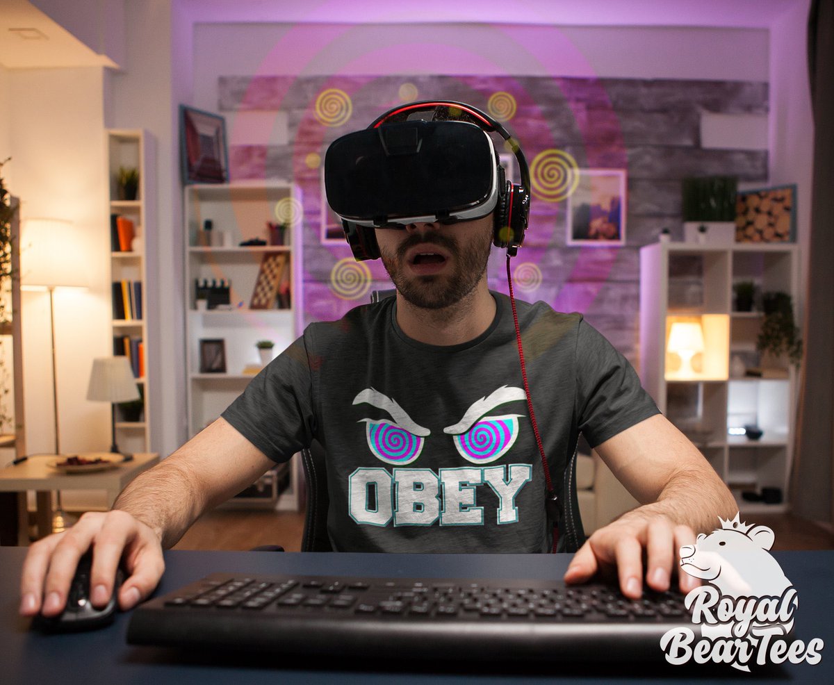 Stateslave1's tweet photo. The gifted shirt from @PrinnyTalis came with a headset. Aaron tried both items on. A game displayed before his eyes. #HypnosGames was working in conjunction with RoyalBearTees. Aaron was powerless to resist the game, the control, as he mindlessly repeated the words on his shirt. https://t.co/1IZiu9Aaef