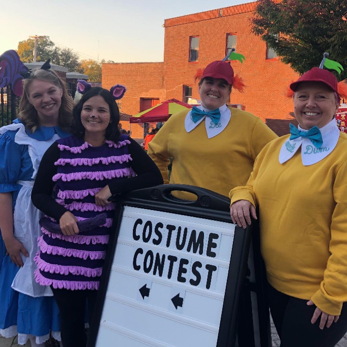 acpublib's tweet photo. The library is YOUR wonderland!  We’ve enjoyed dressing the part this evening for #FirstFridays with the @HeartofSville.  We will announce winners of our book character costume contest on Monday after noon.  Those with pumpkin vouchers can swing by after 12PM on Monday as well! https://t.co/L2wfDXceBU