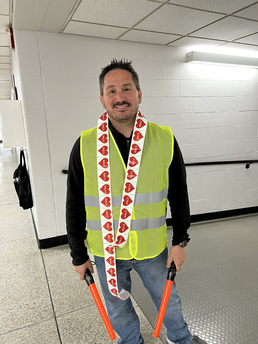 We love when <a href="/MrKman21/">Mr. Ben Kellerman</a> is here because he is one of the best when it comes to safety at arrival and celebrating our students who show Heritage ❤️ #WEchooseLakota #HECAmagic #checkoutallthosestickers