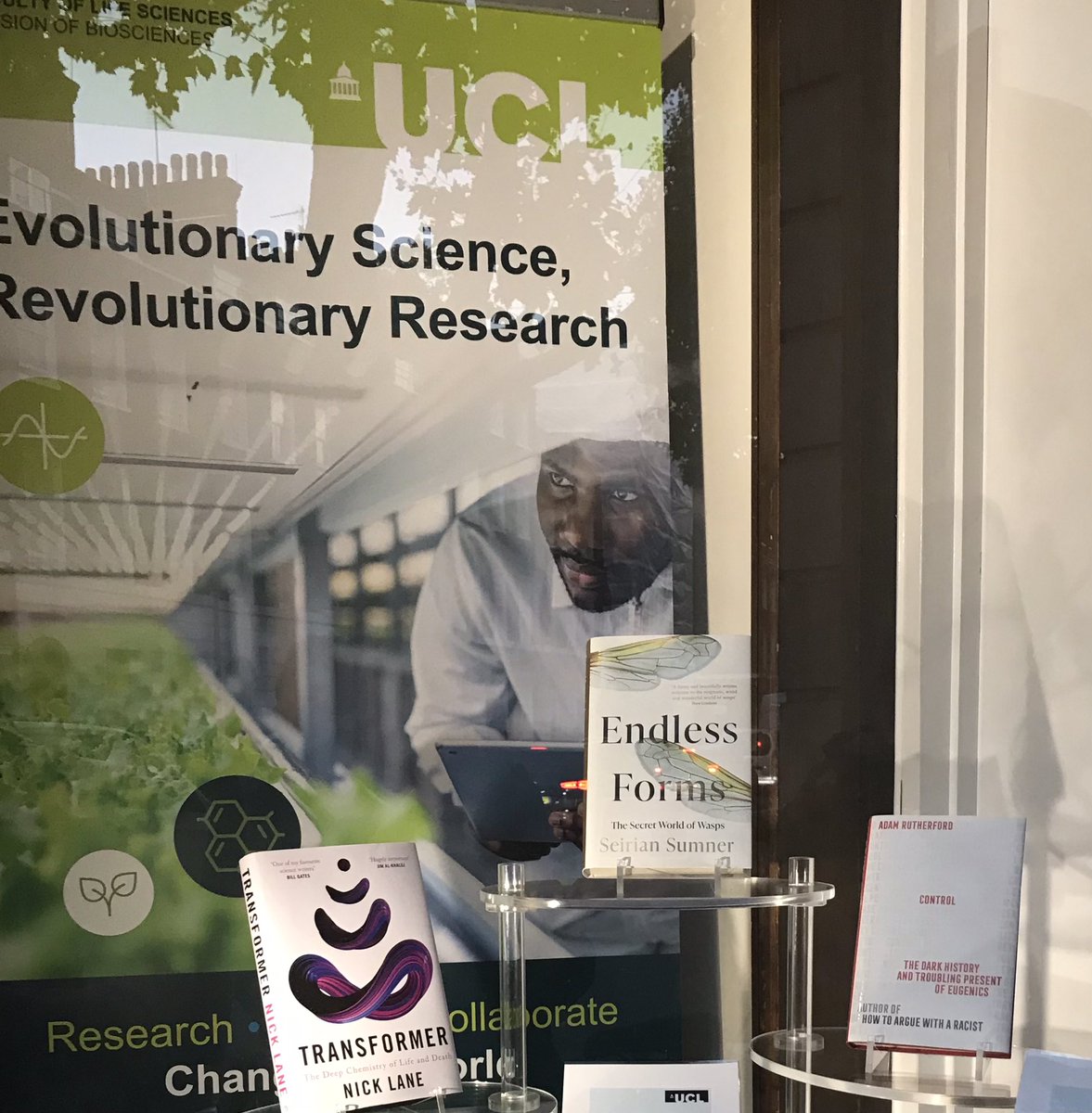 WaspWoman's tweet photo. When a DM-clad 18 yo from #Welsh #comp school @YGAberaeron arrived @uclbiosciences to study Zoology in the 1990s, sheβd no clue that one day her own book would be in the window of the same #GowerStreet bldg sheβd studied in, alongside #sciencesuperstars Nick Lane @AdamRutherford https://t.co/wNpGT61E6Q