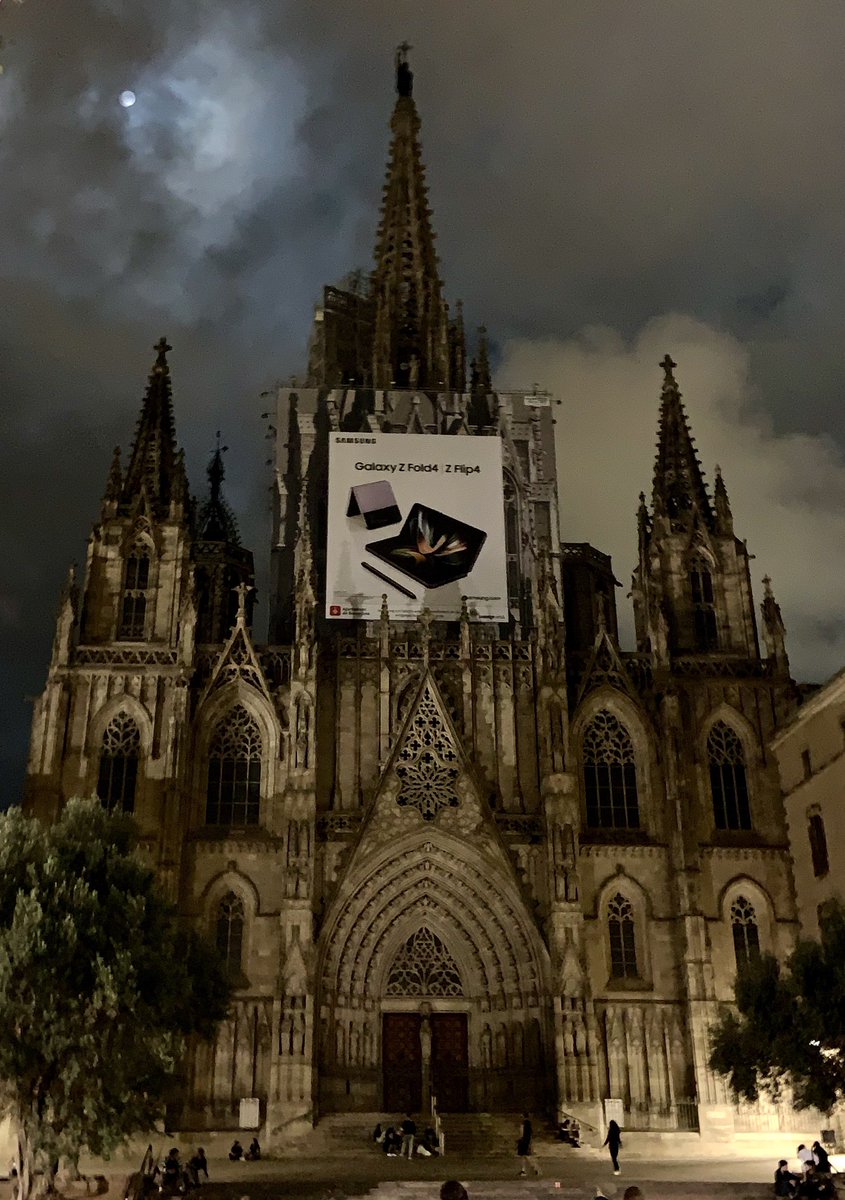mzjulius's tweet photo. Apparently nothing is sacred anymore and everything’s for sale: Barcelona’s 14th-century Cathedral plastered with a #samsung billboard. https://t.co/xjfsYAtQgp