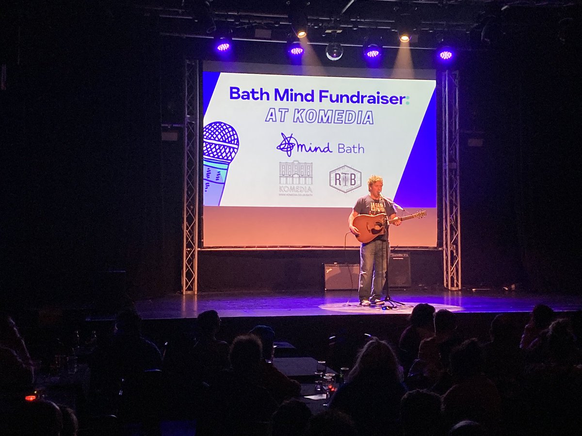 That concludes #WorldMentalHealthDay2022 
Brilliant night at @KomediaBath with my @BathMind hat on.
Here’s an action shot of <a href="/gavin_osborn/">Gavin Osborn</a> doing a bit of chatting in between songs. He’s very good at both the chatting and the singing.