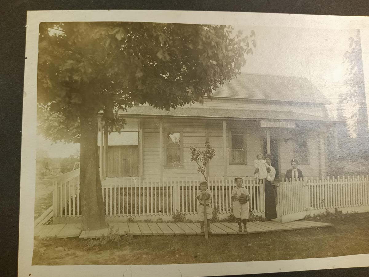 Photo from Sentinel archives. This information on back: "Caroline Faber with children Harry, Elmer, Louise. Also Amanda Raymond." If you'd like it, send a note to edl@catholicsentinel.org.