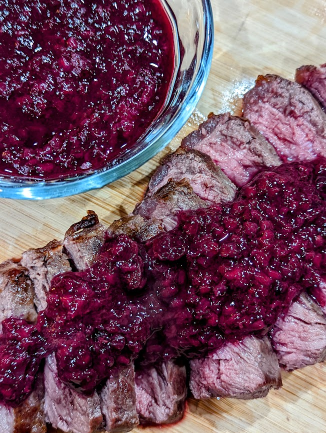 ChefBolek's tweet photo. To honor Indigenous Peoples' Day, I made Wojape or Wozapi. It is a sauce made by the indigenous peoples, such as the Sioux ,with chokecherries. I don't have access to fresh chokecherries, so I made mine with blackberries, raspberries and blueberries. Served on sliced bison loin. https://t.co/xchUVYlvaw