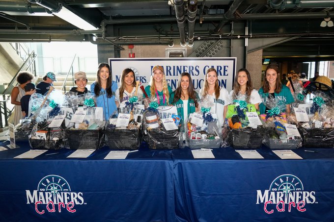 Mariners Wives Favorite Things Auction table at T-Mobile Park. 