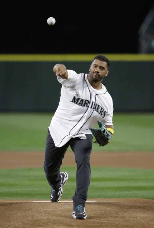 zachleft's tweet photo. If the mariners are truly committed to chaos they will find a way to get russell wilson to throw the first pitch for game 3 https://t.co/l52VAKcq2X