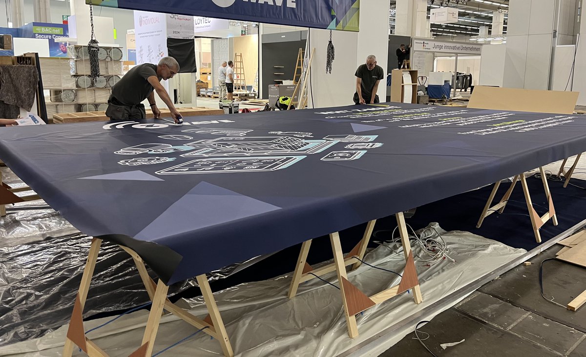 AMCExhibitions's tweet photo. Here's @ZWave_Alliance exhibition stand @Light_Building in Frankfurt. See the team installing the large format seamless graphics and carpet detailing to create a striking and elegant stand. https://t.co/fuMO5Rd7AW