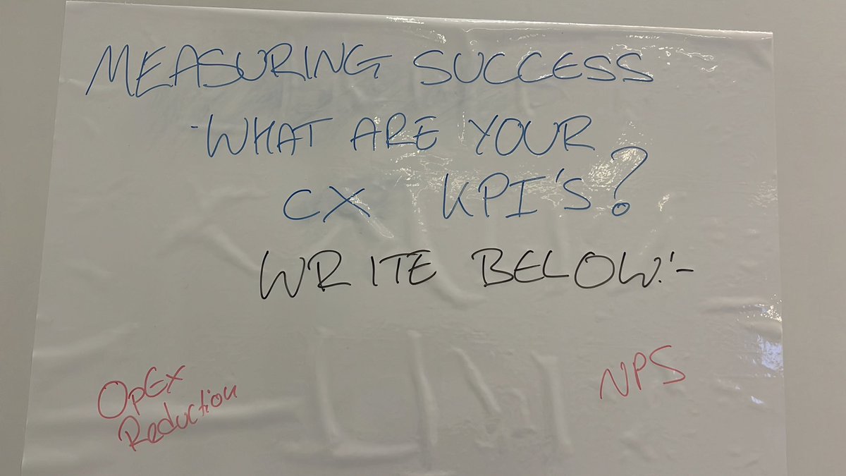 Rob_Koster's tweet photo. We want to know what #CX is to you, #pharma2022. Come to the @eGain booth to write on our walls! (We have chocolate too) https://t.co/vwN1hMZt9j