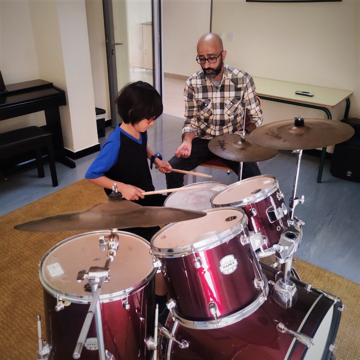 ICS_Amman's tweet photo. We are bringing the gift of #MusicICS to our students by orchestrating over 50 weekly private vocal and instrumental lessons covering specialist instruction from voice and piano to oud, drums and everything in between, allowing our musically-inclined student to #ThriveICS #BAHICS https://t.co/xj5qAgidna