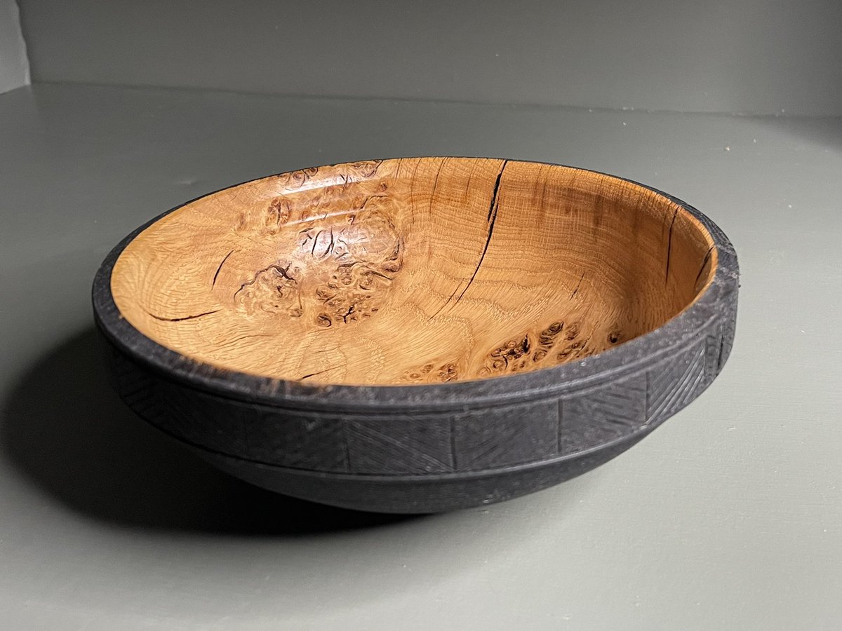 Orkwoodturner's tweet image. Oak bowl, straight from the gouge, no sanding . Black vinegar solution stain, bit of pyro on the rim and a coat of oil. Still some work to do yet but getting there.